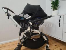 Продам коляску bugaboo, автокресло ,качелю