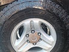 Продается комплект шин  A/T TOYO 265.75R16