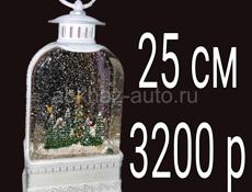 Продаются снежные фонари с блестками.