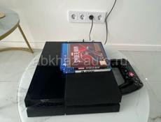 Продаю свою игровую приставку PS4 в идеальном  состояниии