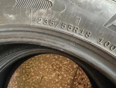 235/55R18 