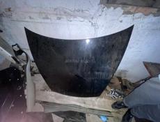 Фара и капот Порш Каен 