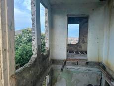 УЧАСТОК 4 СОТКИ С КАРКАСОМ ДОМА  СУХУМ РАЙОН ВОКЗАЛА