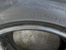 235-55 R18 