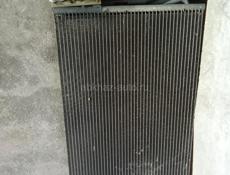E90 радятор кандицанера 