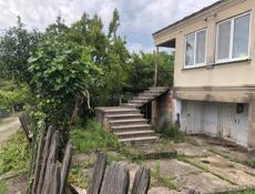 Продам дом с участком  улица комсомольская 2 км от моря 