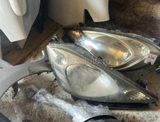 Honda Fit стопы , фары, зеркала, лобовое стекло, бампера, дверь багажник и много других запчастей в наличии и под заказ 