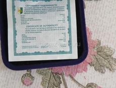 Серебряная  монета  С. Сосналиева 