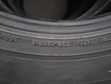 235 55 R18 