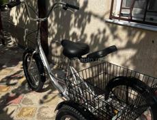 Новый трёхколёсный велосипед