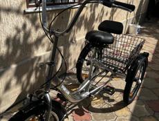 Новый трёхколёсный велосипед