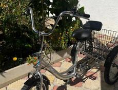 Новый трёхколёсный велосипед