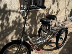 Новый трёхколёсный велосипед