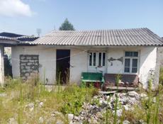 Продаю участок В Сухуми  улица Титова дом 52 рядом с рыноком