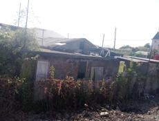 Продаю участок В Сухуми  улица Титова дом 52 рядом с рыноком