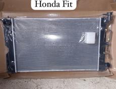 Honda Fit радиаторы , дверь багажника,фары, бампер, капоты, компрессор кондиционера и много других запчастей в наличии и под заказ 