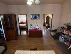  трехкомнатную квартиру, расположенную в г. Сухум на Новом Районе