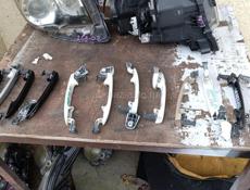 Toyota Voxy крепление бампера, фары, радиаторы, вентиляторы, лобовое стекло, бампера и много других запчастей в наличии и под заказ