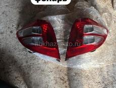 Honda Fit дверь багажник, бампер, задний фонарь, фары, зеркала, лобовое стекло и много других запчастей в наличии и под заказ 