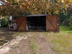 Продаётся  бельетажный дом с участком и гаражем.