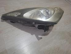 Фара хонда фит 2009 года 