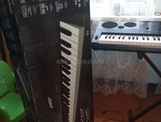 Синтезатор Casio,практически новый.