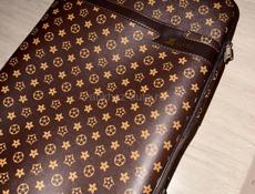 отдам новый чемодан