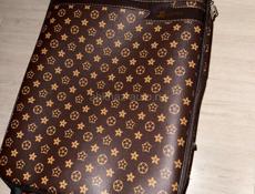 отдам новый чемодан