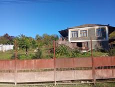 Дом с земельным участком 124 соток.