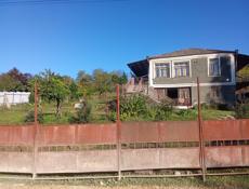 Дом с земельным участком 124 соток.