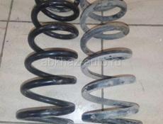 Пружина задняя