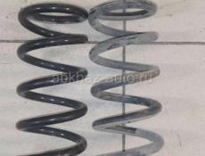 Пружина задняя