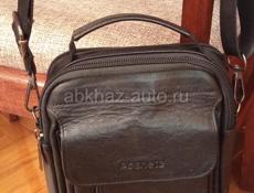 Продам новую мужскую барсетку кожаная.