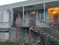 Продам дом 5 комнатны жилой есть родник питьевая вода большой гараж 