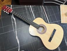 Гитара новая 