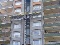Фасадный строительный подъемник в аренду
