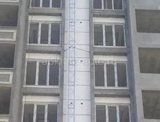 Фасадный строительный подъемник в аренду