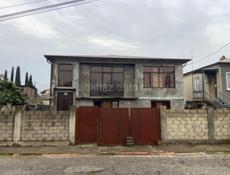 Дом с строительным участком 