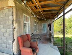 Продаётся дом с участком в городе Гудаута, ул. Отырба