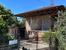 Продаётся дом с участком в городе Гудаута, ул. Отырба