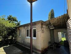 Продаётся дом с участком в городе Гудаута, ул. Отырба