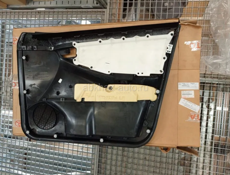 Обшивка двери COROLLA (2001)