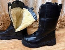 Продам новые сапоги
