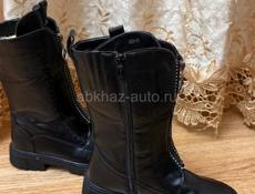 Продам новые сапоги