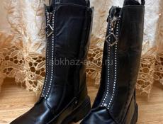 Продам новые сапоги