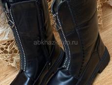 Продам новые сапоги