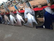 Honda Fit крылья, капоты, бампера, радиаторы, фары , стопы, катушки, зеркала и тд