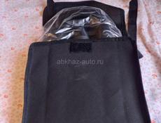 Два новых бинокля в чехле.