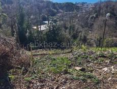 Обменяю участок 6 соток на квартиру в Гудауте или машину