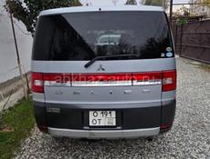 Делика 2007 год полное каплектация 2.4 полный привод есть блокировка в хорошем состоянии 600 т небольшой торг  3 люка 